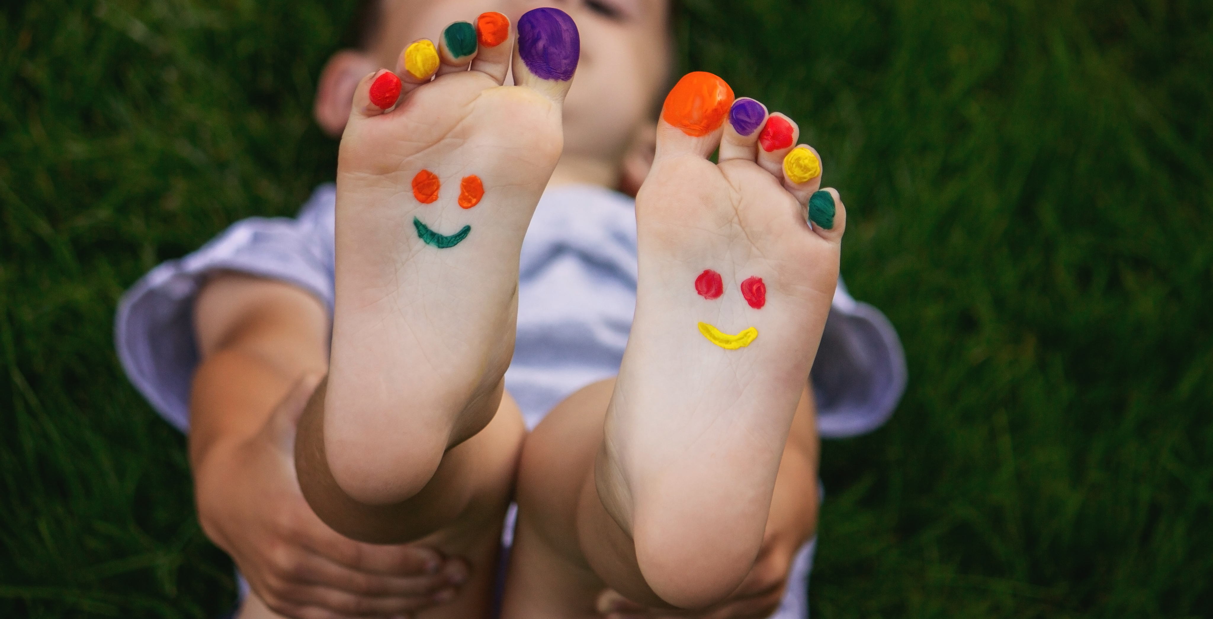 Kids pedicure with colourful polish